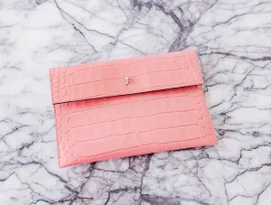 Alexander McQueen Skull Charm Embossed Clutch Bag in Rosa