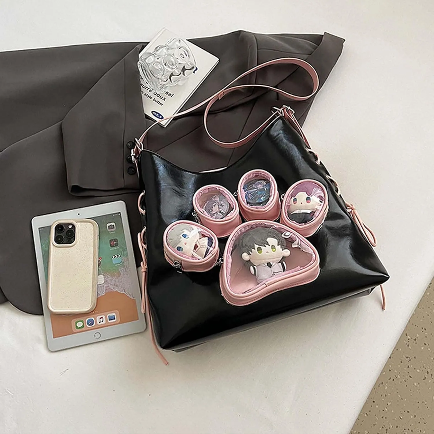Cute cat paw shaped shoulder bag with large capacity for women, featuring a transparent doll display window